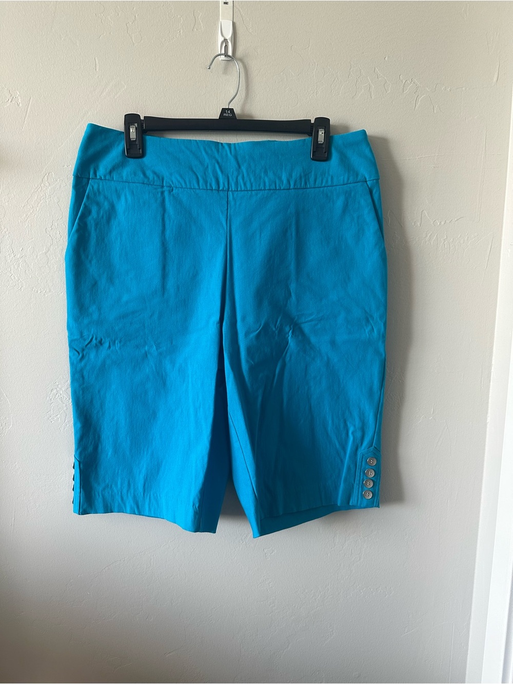 Bright Turquoise Bermuda Shorts with Side Button Detail